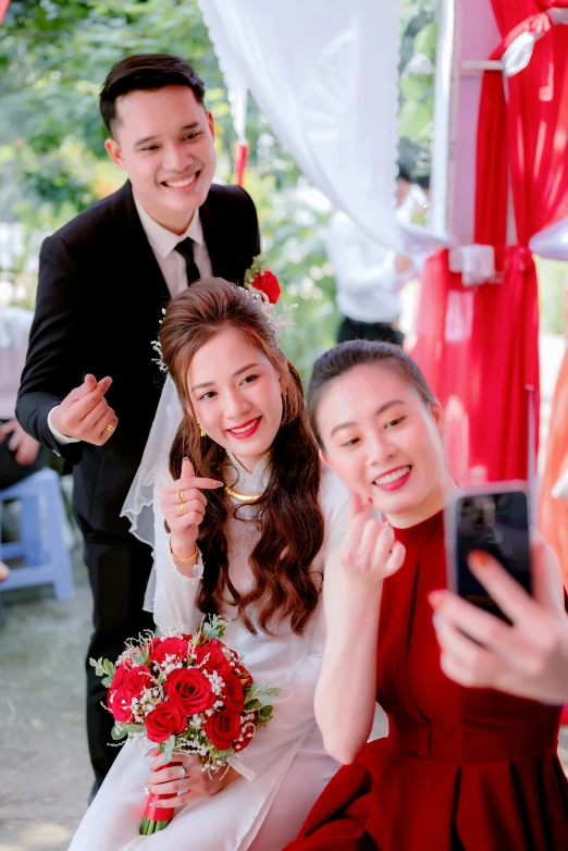 a couple is posing for a po at a wedding