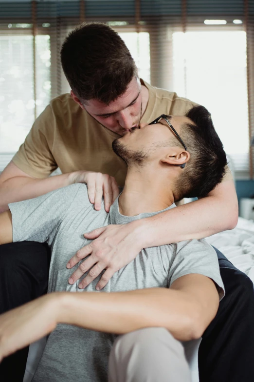 a couple in love getting kissed by each other