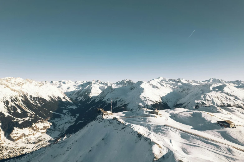 a picture of the landscape in snow covered mountains