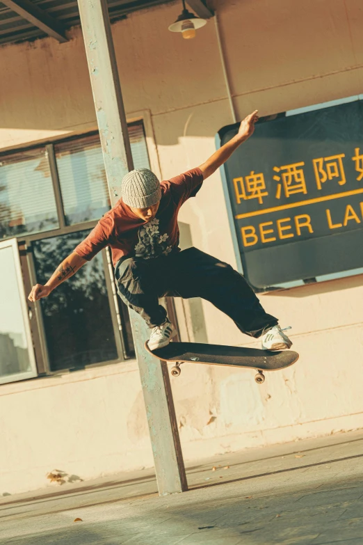 a man jumping in the air on top of a skateboard