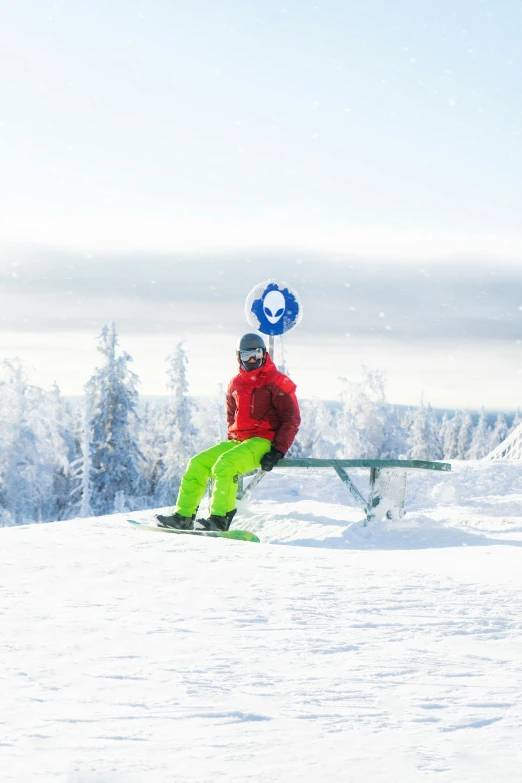 a man riding down a snow covered ski slope