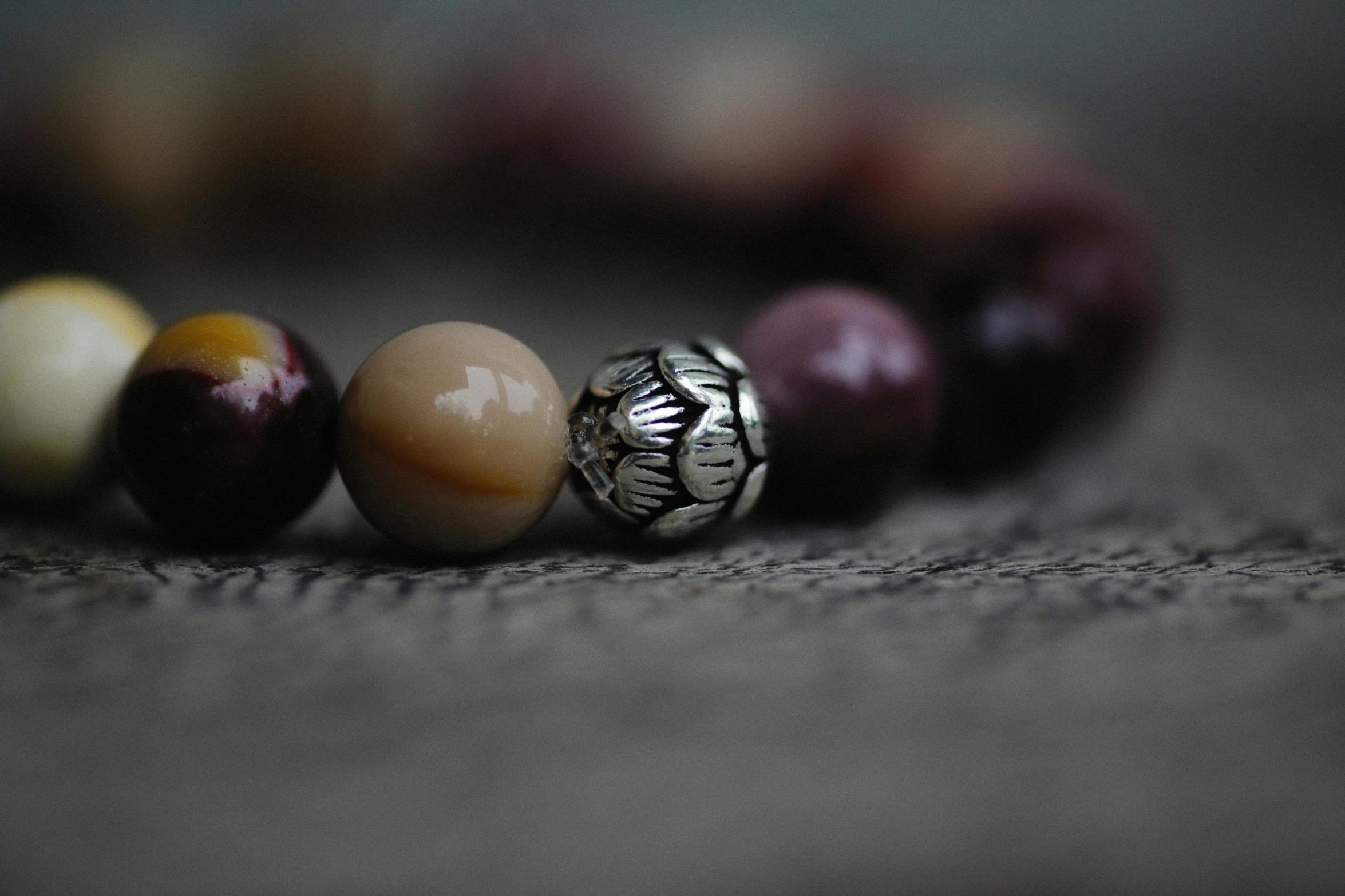 beaded celet with four different colored beads