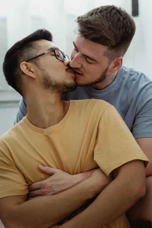 two men kissing each other by the end of their conversation