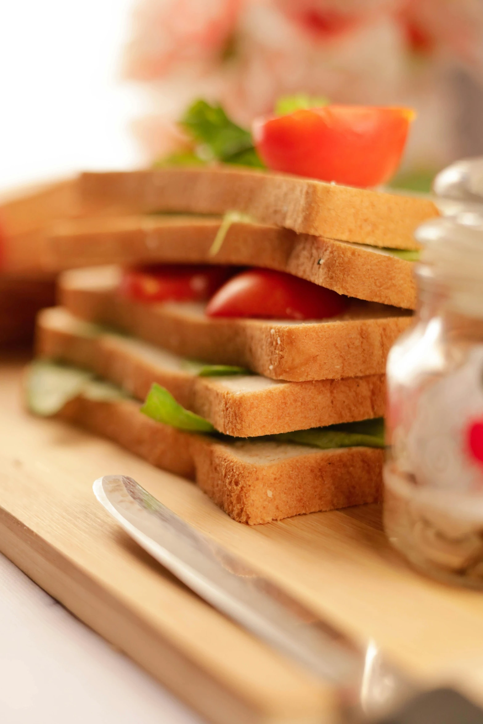 the pieces of bread are being stacked on top of each other