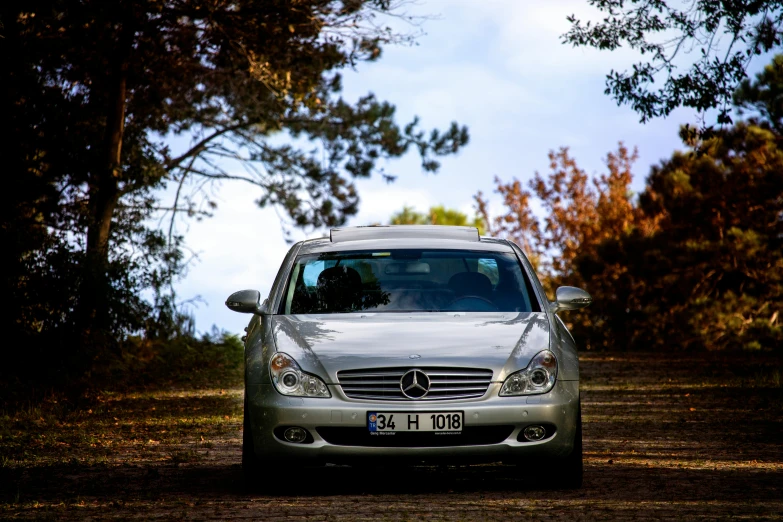 a car that is sitting in the dirt