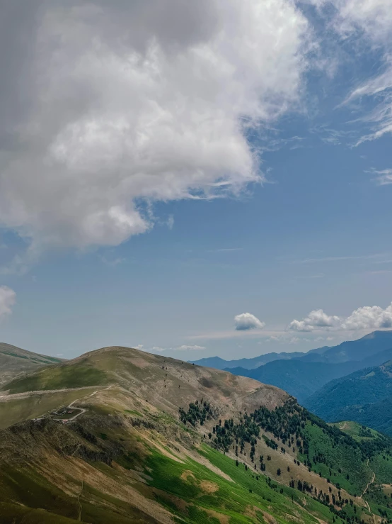 some very pretty mountain scenery with green hills