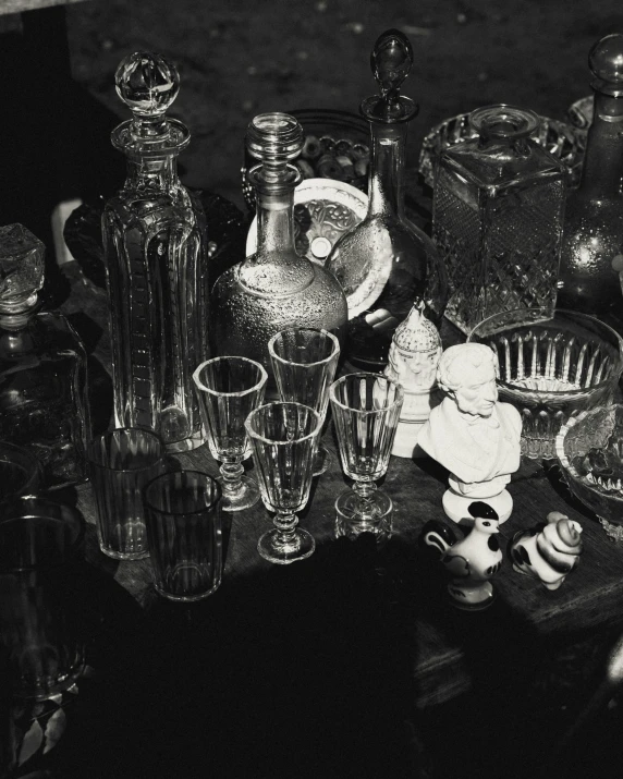 black and white pograph of a collection of vases and plates