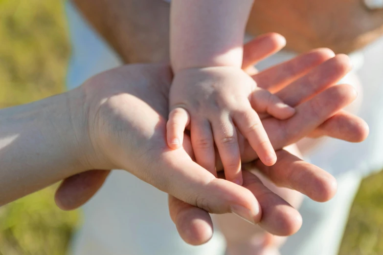 a group of children holding hands together with each other