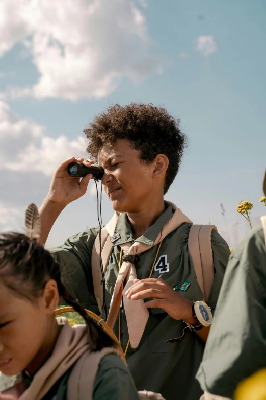 a man in camouflage talking on his cellphone