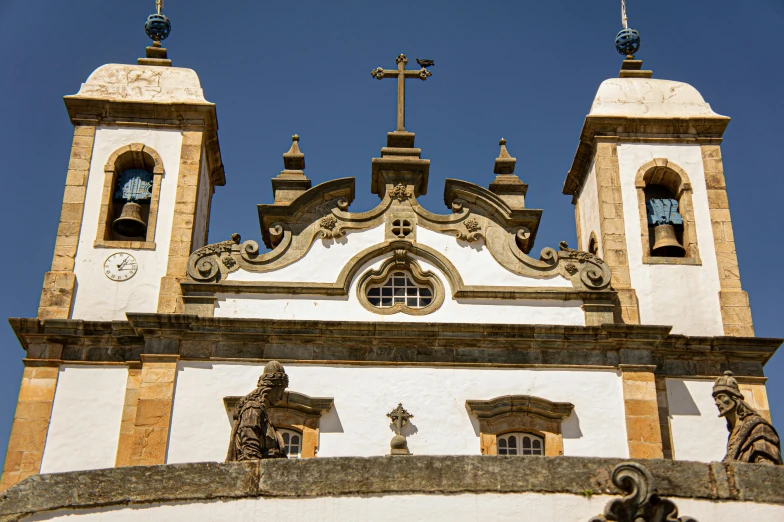 an old church with a cross on it