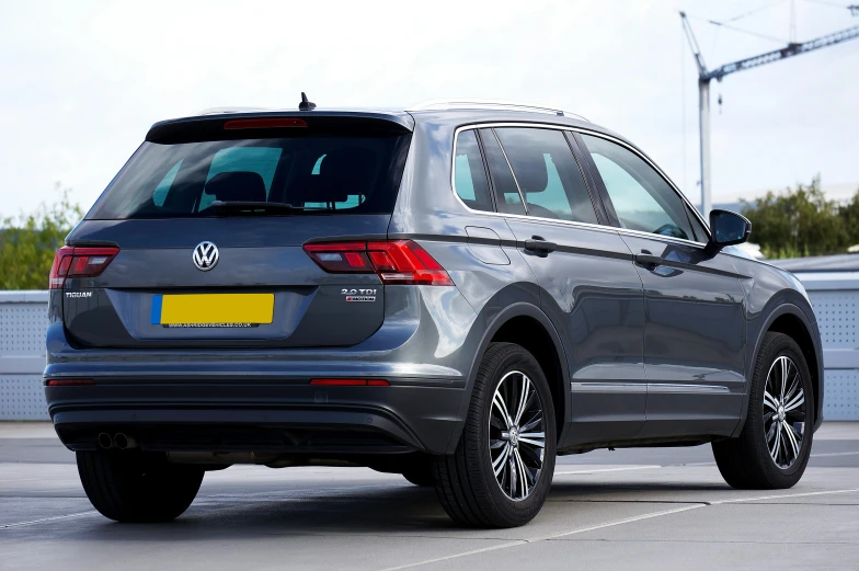 the rear of a grey volkswagen suv