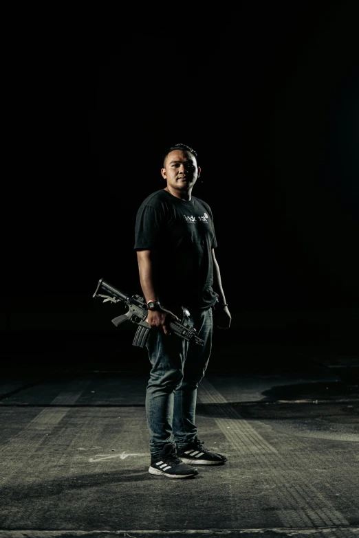 a man is standing on a skateboard holding a large pipe