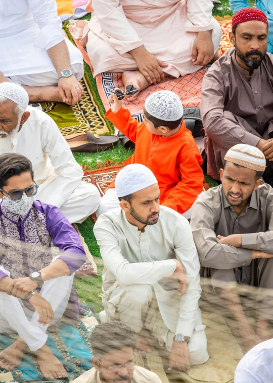 people sitting in a circle near each other