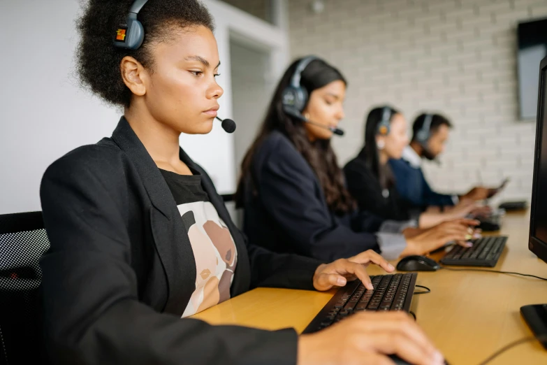 a group of people that are on a keyboard