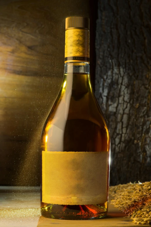 a bottle of wine sitting on top of a wooden table