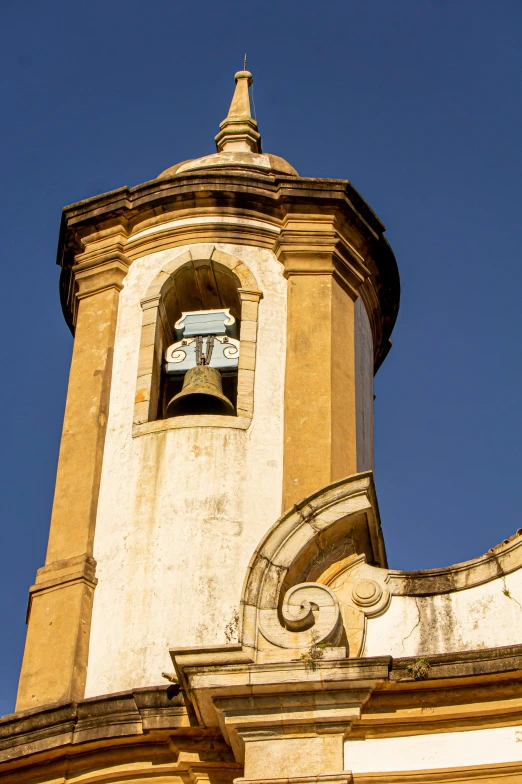 a bell tower with the top part broken off