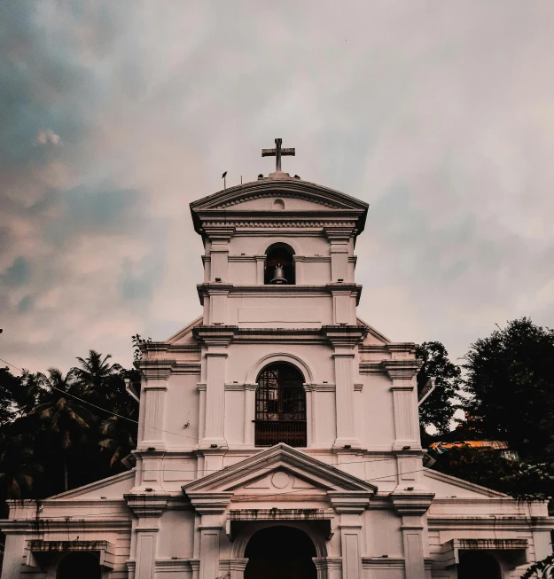 the front of a church on a cloudy day