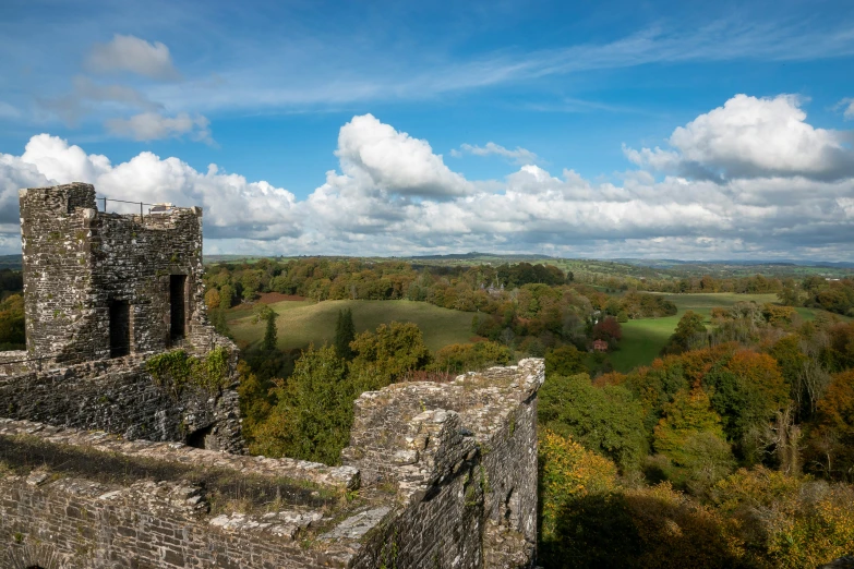 looking out over the valley at the countryside from inside castle wall