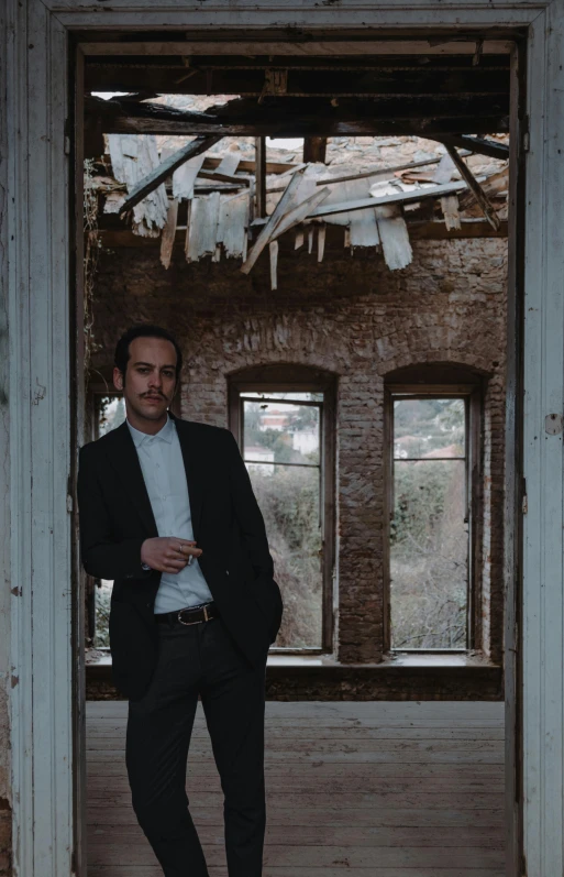 a man standing in an open doorway of a room