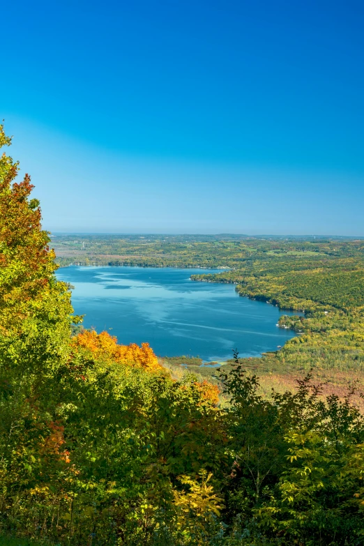 the scenic view looking down at the lake from above