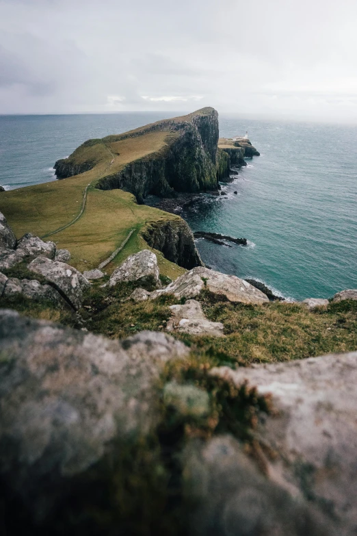 an island with a large seawall off the edge