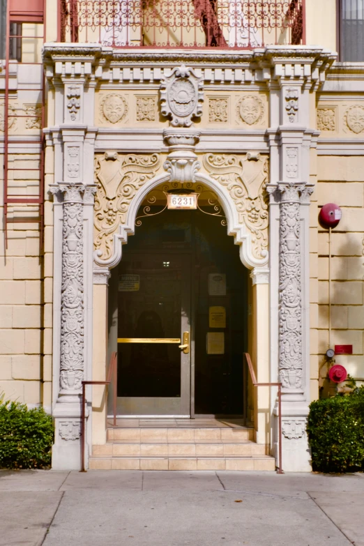 there is a large building with columns and a door