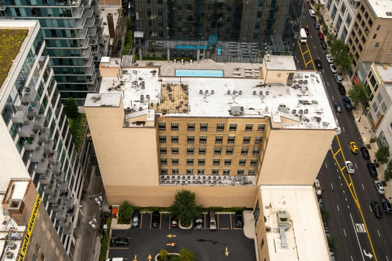 an aerial view of a city with large buildings