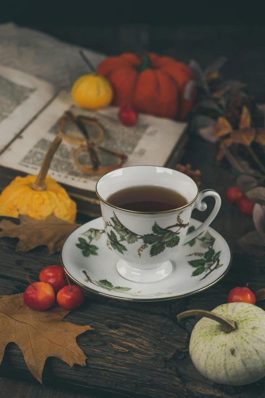 a cup of tea is placed on a table