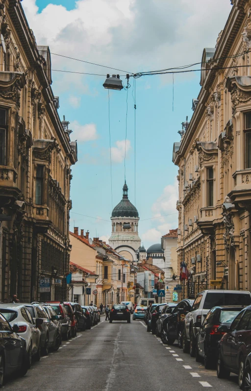 the building on the left has a dome on top