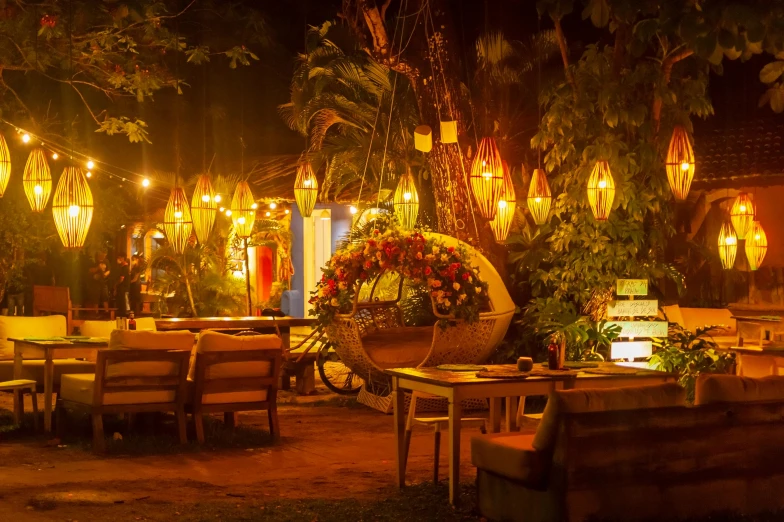 the inside of a restaurant with lights lit up at night