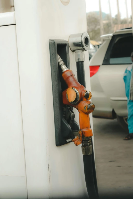 the back of a truck with a gas pump next to it