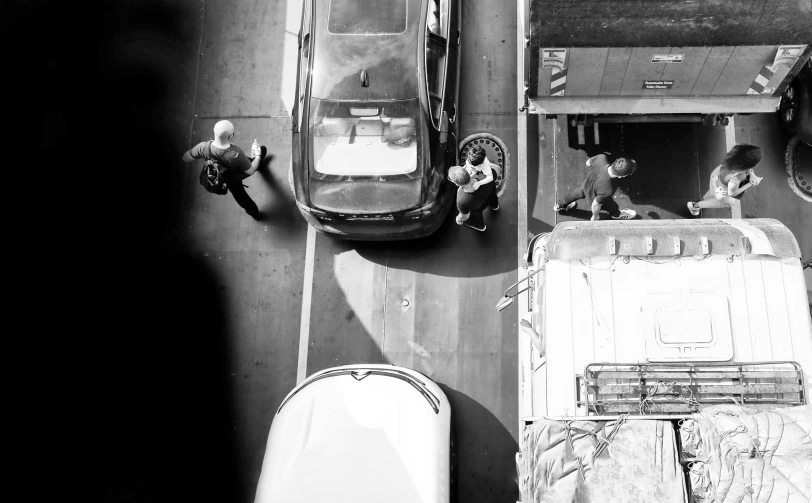 black and white po of cars on the street