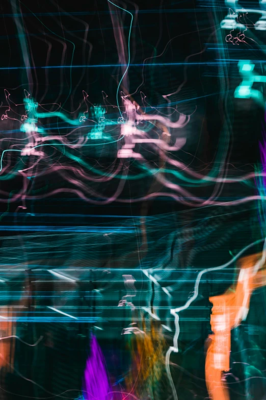a blurred pograph of blurry lights with blue and purple