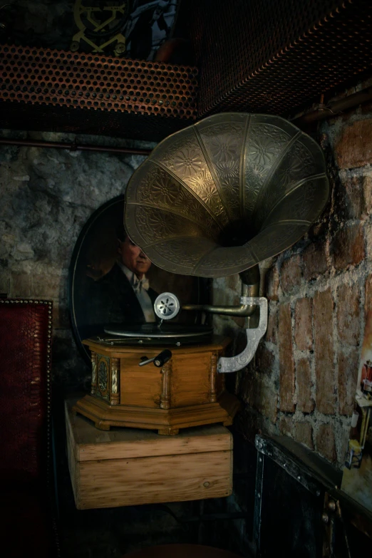 a man with an old record player playing music