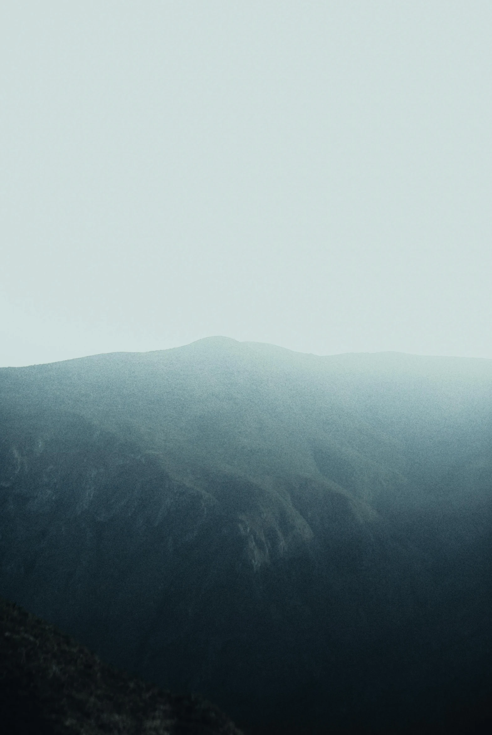 an image of a mountain view in a misty scene