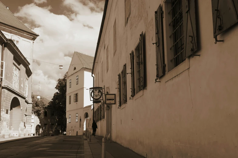 black and white po of alleyway with windows