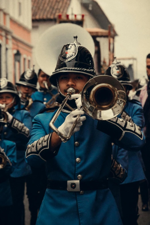 people in uniforms are playing instruments and singing