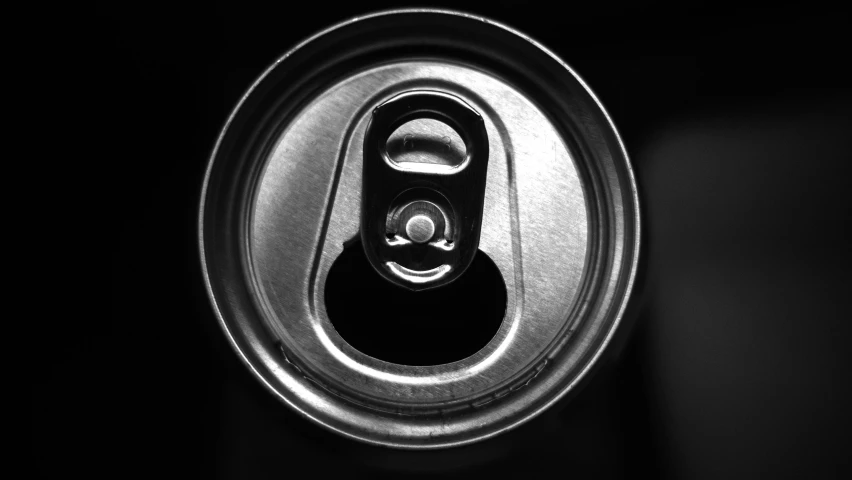 a can with a black background that is made up of metal