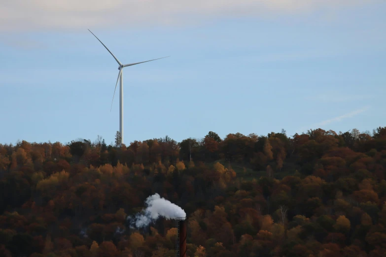 an industrial chimney emitting from a factory chimneys