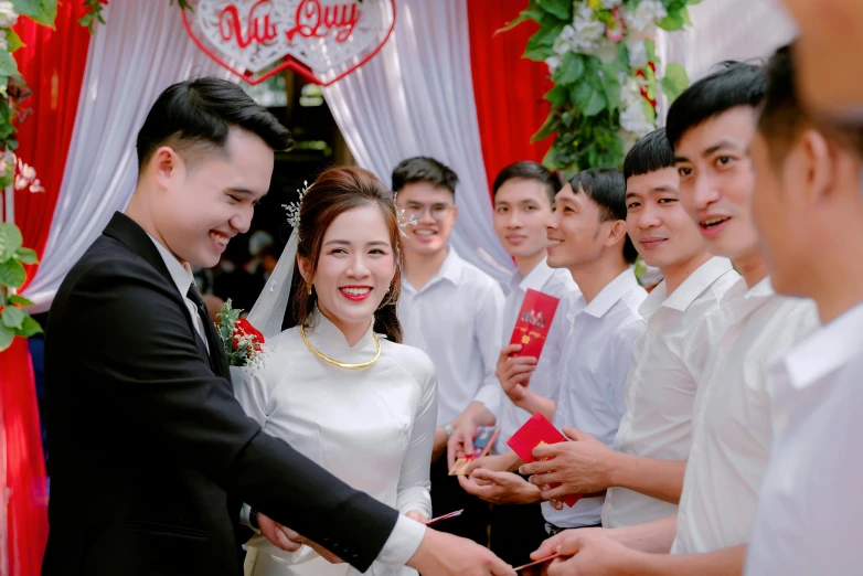 a groom and bride exchange vows as the bride stands near him