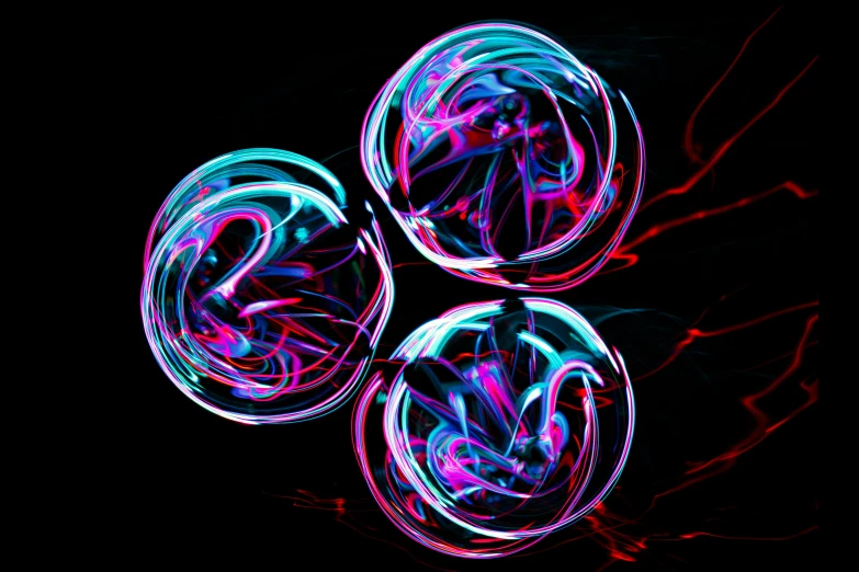 three circles on top of each other with neon colors