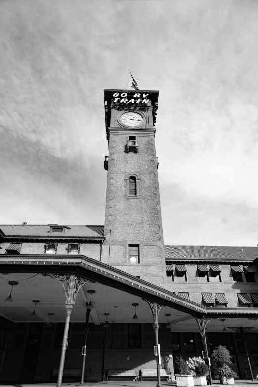 black and white pograph of a tall clock tower