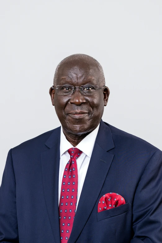 an african american business man wearing a suit and tie