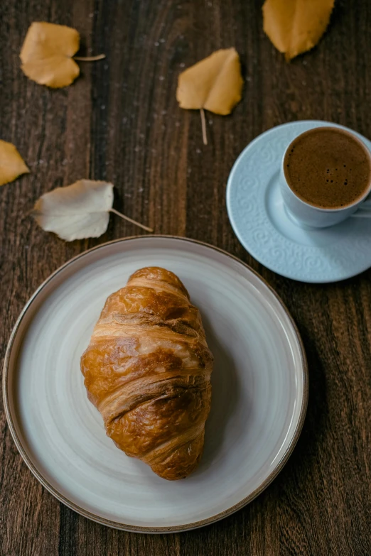 this is a delicious pastry and cup of coffee