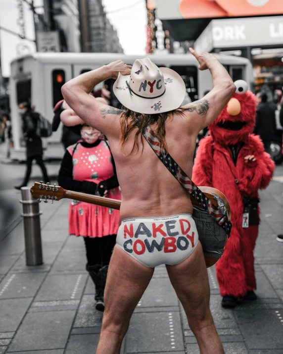 a  cowboy in his underwear and hat