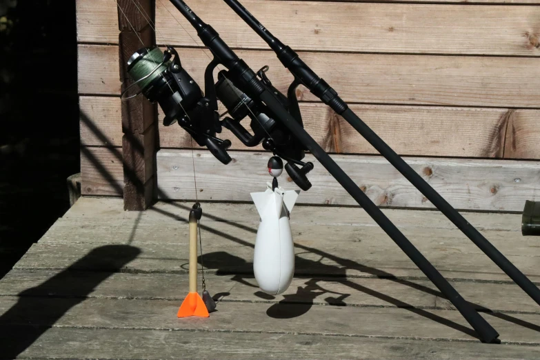 a group of fishing equipment standing on a deck