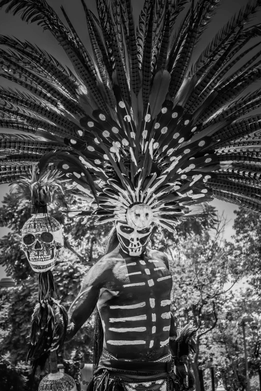 an indian man is dressed in all black and white