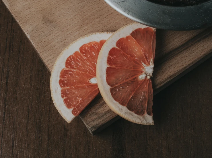 a close up of a piece of food on a  board