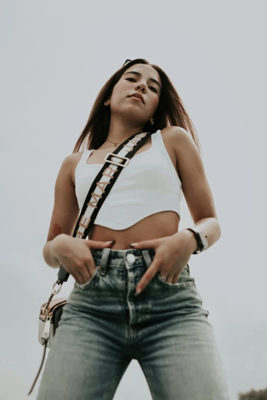 young woman standing with her back to the camera