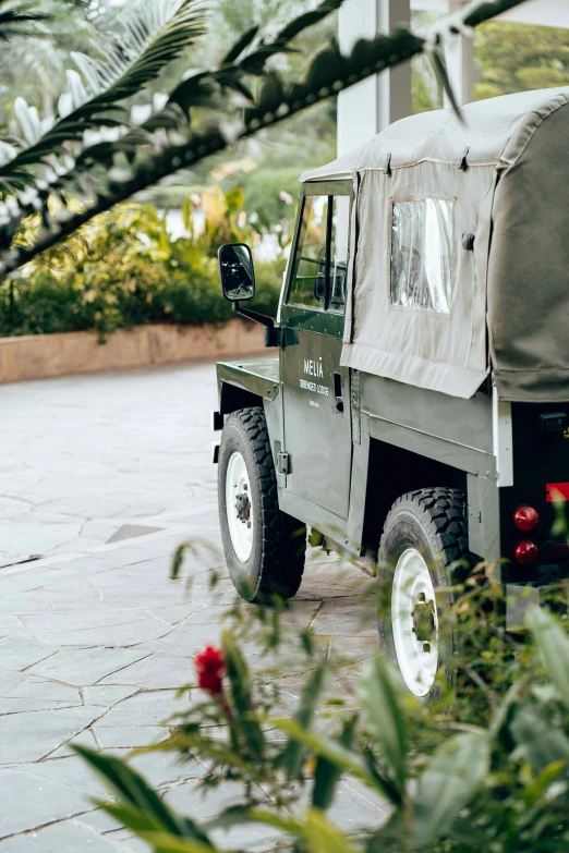 a green truck that is sitting outside